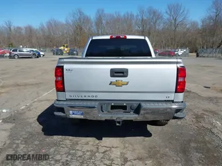 2015 Chevrolet Silverado 1500 LT with VIN 3GCUKREC4FG445820, listed as a IAAI auction lot 41844159 with 141,530 mi miles. Bid and sale history available at carsss.com. Image 16.