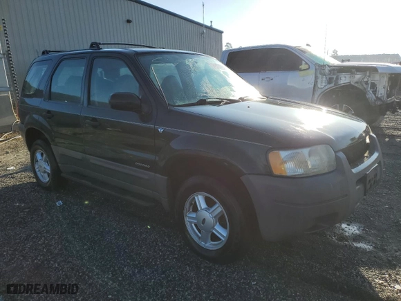 2001 Ford Escape XLS with VIN 1FMYU01161KA46822, listed as a Copart auction lot 48810055 with 253,402 mi miles and Salvage Title. Bid and sale history available at carsss.com. Image 4.