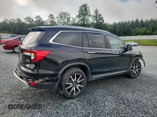 2019 Honda Pilot Elite with VIN 5FNYF6H05KB071031, listed as a Copart auction lot 60777585 with 96,155 mi miles and Salvage title. Bid and sale history available at DreamBid. Image 3.