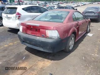 2003 Ford Mustang Standard z VIN 1FAFP40473F441647, wystawiony jako IAAI lot #42179189 z przebiegiem 138 460 mil mil oraz . Historia ofert i sprzedaży dostępna na DreamBid. Obrazek 4.
