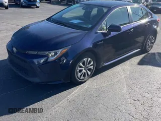 2021 Toyota Corolla Hybrid LE with VIN JTDEAMDE0MJ009233, listed as a Copart auction lot 47051805 with 212,244 mi miles and Clean Title. Bid and sale history available at carsss.com. Image 2.