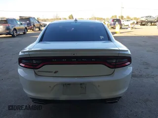 2019 Dodge Charger SXT with VIN 2C3CDXJG1KH533323, listed as a IAAI auction lot 41369282 with 102,467 mi miles and . Bid and sale history available at DreamBid. Image 17.