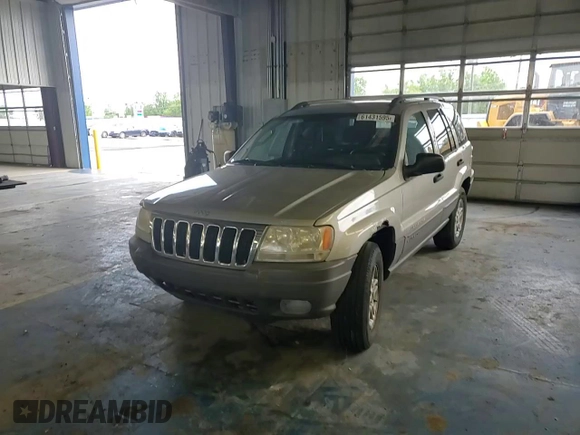 2003 Jeep Grand Cherokee Laredo with VIN 1J4GW48S43C567559, listed as a Copart auction lot 61431595 with 249,998 mi miles and Salvage title. Bid and sale history available at DreamBid. Image 14.