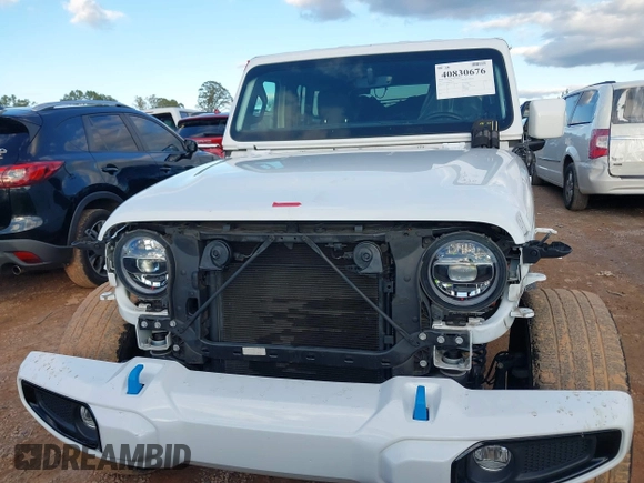 2021 Jeep Wrangler Unlimited Sahara with VIN 1C4JJXP64MW840094, listed as a IAAI auction lot 40830676 with 31,716 mi miles and . Bid and sale history available at DreamBid. Image 13.