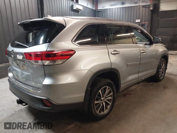 2018 Toyota Highlander SE with VIN 5TDJZRFH5JS912469, listed as a IAAI auction lot 42332840 with 74,386 mi miles and . Bid and sale history available at DreamBid. Image 4.