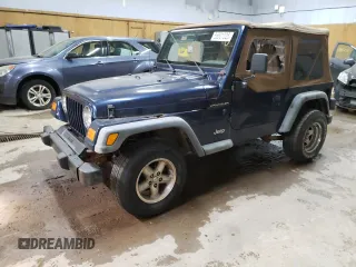 2000 Jeep Wrangler SE with VIN 1J4FA29P1YP739555, listed as a Copart auction lot 58501025 with 128,458 mi miles and Clean title. Bid and sale history available at DreamBid. Image 1.