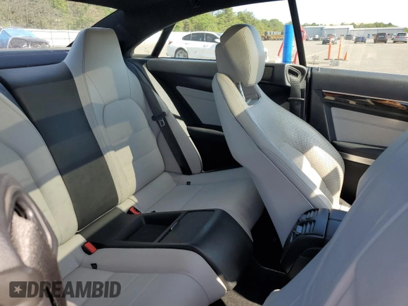 2016 Mercedes-Benz E 400 with VIN WDDKJ6HB3GF321767, listed as a Copart auction lot 61826015 with 76,314 mi miles and Salvage title. Bid and sale history available at DreamBid. Image 10.