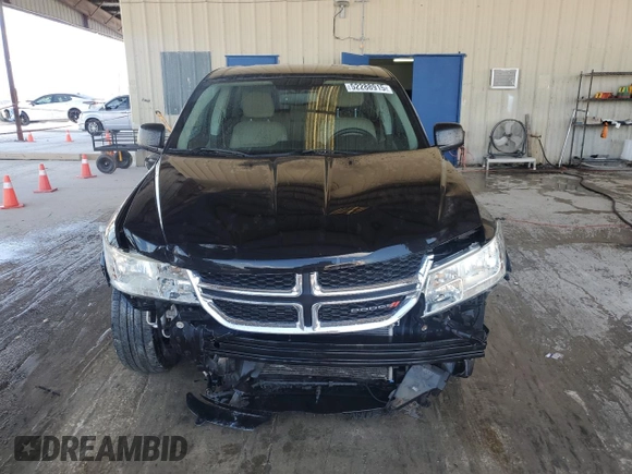 2013 Dodge Journey American Value with VIN 3C4PDCAB2DT684871, listed as a Copart auction lot 52288915 with 119,569 mi miles and Salvage title. Bid and sale history available at DreamBid. Image 5.