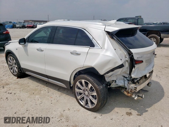 2023 Cadillac XT4 FWD Premium Luxury with VIN 1GYFZCR42PF110122, listed as a Copart auction lot 57332955 with 11,427 mi miles and Salvage title. Bid and sale history available at DreamBid. Image 2.