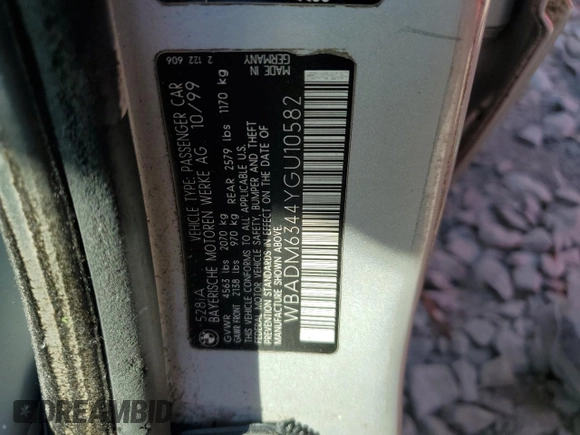 2000 BMW 5 Series 528iA with VIN WBADM6344YGU10582, listed as a Copart auction lot 77468634 with 0 mi miles and Salvage Title. Bid and sale history available at carsss.com. Image 12.