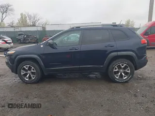 2014 Jeep Cherokee Trailhawk with VIN 1C4PJMBB5EW120432, listed as a IAAI auction lot 41973114 with 88,795 mi miles. Bid and sale history available at carsss.com. Image 14.