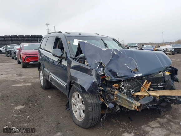 2009 Jeep Grand Cherokee Limited with VIN 1J8HR58P89C542314, listed as a IAAI auction lot 41880894 with 103,032 mi miles. Bid and sale history available at carsss.com. Image 12.