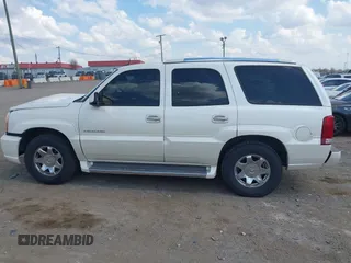 2005 Cadillac Escalade z VIN 1GYEC63T55R115387, wystawiony jako IAAI lot #41791855 z przebiegiem 165 246 mil mil oraz . Historia ofert i sprzedaży dostępna na DreamBid. Obrazek 15.