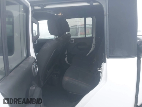 2022 Jeep Gladiator Rubicon z VIN 1C6JJTBG3NL111054, wystawiony jako IAAI lot #40793144 z przebiegiem 40 115 mil mil oraz . Historia ofert i sprzedaży dostępna na DreamBid. Obrazek 8.