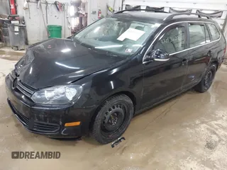 2014 Volkswagen Jetta SportWagen TDI w/Sunroof & Nav with VIN 3VWPL7AJ2EM626110, listed as a IAAI auction lot 42093622 with 115,691 mi miles. Bid and sale history available at carsss.com. Image 2.