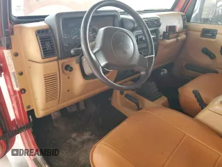 1997 Jeep Wrangler Sport with VIN 1J4FY19S3VP489709, listed as a Copart auction lot 53937475 with 127,171 mi miles and Salvage Title. Bid and sale history available at carsss.com. Image 8.