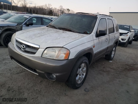 2003 Mazda Tribute LX with VIN 4F2YZ94133KM20084, listed as a Copart auction lot 82598104 with 216,848 mi miles and Salvage Title. Bid and sale history available at carsss.com. Image 1.