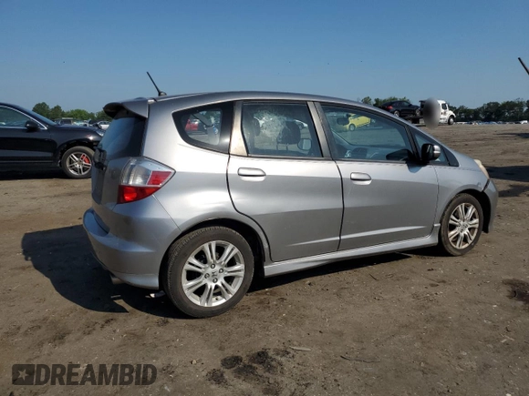 2010 Honda Fit Sport with VIN JHMGE8H47AS023964, listed as a Copart auction lot 61797995 with 78,518 mi miles and Salvage title. Bid and sale history available at DreamBid. Image 3.