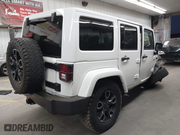 2017 Jeep Wrangler Unlimited Sahara with VIN 1C4BJWEG2HL700840, listed as a IAAI auction lot 42631036 with 60,610 mi miles and . Bid and sale history available at DreamBid. Image 4.