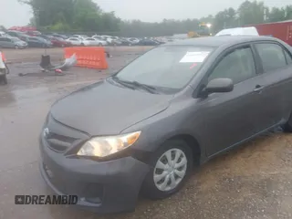 2011 Toyota Corolla L with VIN JTDBU4EE3B9140115, listed as a IAAI auction lot 42052792 with 143,646 mi miles and . Bid and sale history available at DreamBid. Image 18.