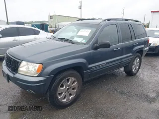 2001 Jeep Grand Cherokee Limited with VIN 1J4GW58S21C673916, listed as a IAAI auction lot 42127522 with Not Provided miles and . Bid and sale history available at DreamBid. Image 2.