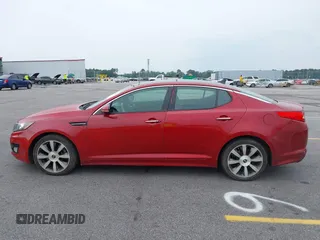 2012 Kia Optima SX z VIN 5XXGR4A65CG010749, wystawiony jako IAAI lot #42424921 z przebiegiem 187 454 mil mil oraz . Historia ofert i sprzedaży dostępna na DreamBid. Obrazek 14.