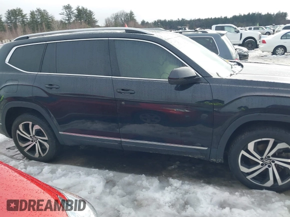2021 Volkswagen Atlas SEL Premium z VIN 1V2TR2CA2MC588943, wystawiony jako IAAI lot #41558964 z przebiegiem 62 182 mil mil oraz . Historia ofert i sprzedaży dostępna na DreamBid. Obrazek 13.