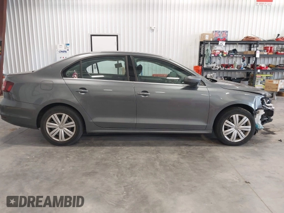 2017 Volkswagen Jetta S with VIN 3VW2B7AJ4HM357707, listed as a IAAI auction lot 42606933 with 124,253 mi miles and . Bid and sale history available at DreamBid. Image 14.