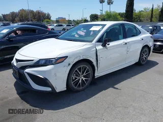 2023 Toyota Camry SE with VIN 4T1G11AK0PU736081, listed as a IAAI auction lot 42090419 with 32,303 mi miles and . Bid and sale history available at DreamBid. Image 17.