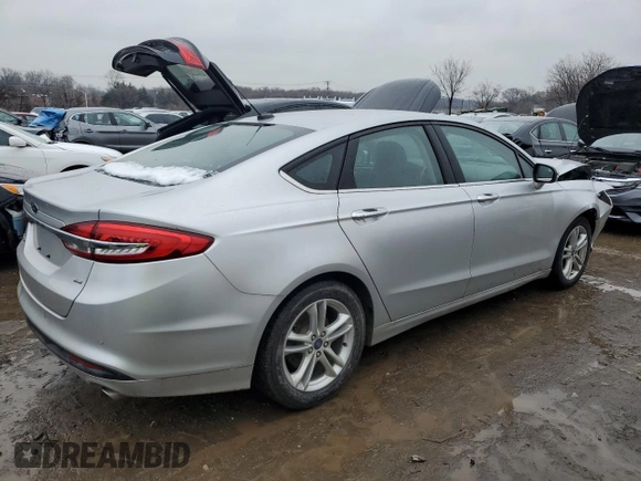 2018 Ford Fusion SE z VIN 3FA6P0H79JR270777, wystawiony jako Copart lot #45319755 z przebiegiem 69 152 mil mil oraz Szkoda całkowita • Salvage title. Historia ofert i sprzedaży dostępna na DreamBid. Obrazek 3.