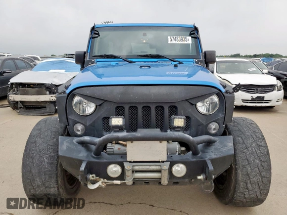 2015 Jeep Wrangler Unlimited Sport with VIN 1C4BJWDG1FL726599, listed as a Copart auction lot 57483935 with 112,067 mi miles and Clean title. Bid and sale history available at DreamBid. Image 5.