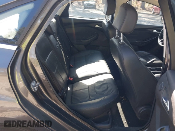 2015 Ford Focus Titanium with VIN 1FADP3J25FL333743, listed as a IAAI auction lot 41857057 with 120,917 mi miles and . Bid and sale history available at carsss.com. Image 8.