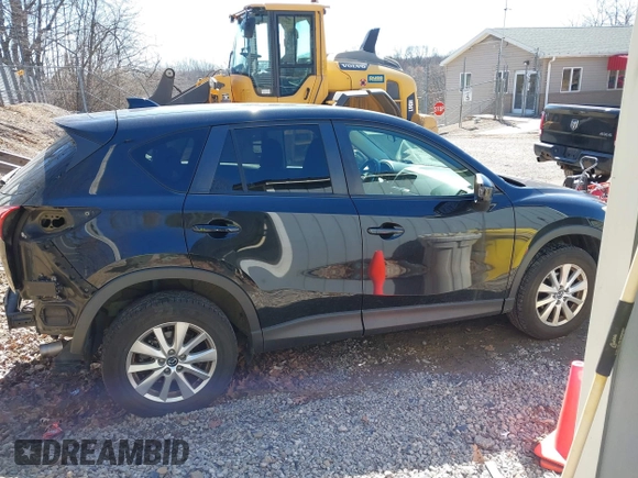 2014 Mazda CX-5 Touring with VIN JM3KE4CY8E0333029, listed as a IAAI auction lot 41857199 with 218,887 mi miles. Bid and sale history available at carsss.com. Image 13.