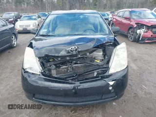 2004 Toyota Prius with VIN JTDKB20U540086767, listed as a IAAI auction lot 41965473 with 262,514 mi miles. Bid and sale history available at carsss.com. Image 6.