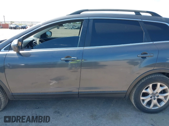 2015 Mazda CX-9 Sport with VIN JM3TB2BA7F0465965, listed as a IAAI auction lot 40348982 with 165,284 mi miles and . Bid and sale history available at carsss.com. Image 14.
