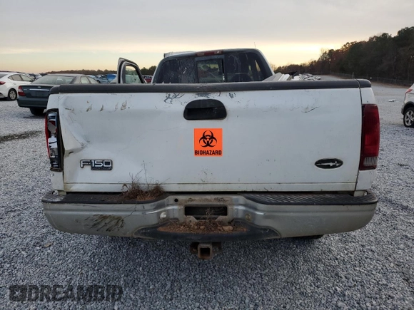 2000 Ford F-150 XL with VIN 2FTRF17L6YCA50613, listed as a Copart auction lot 83528344 with Not provided miles and Salvage title. Bid and sale history available at DreamBid. Image 6.