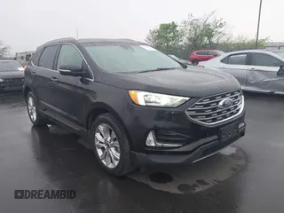 2020 Ford Edge Titanium z VIN 2FMPK3K96LBA20614, wystawiony jako IAAI lot #41906049 z przebiegiem 66 316 mil mil oraz . Historia ofert i sprzedaży dostępna na DreamBid. Obrazek 1.