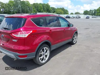 2013 Ford Escape Titanium with VIN 1FMCU0J9XDUD32178, listed as a IAAI auction lot 42754756 with 195,095 mi miles and . Bid and sale history available at DreamBid. Image 4.