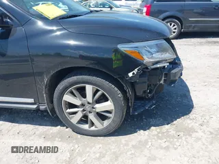 2014 Nissan Pathfinder S with VIN 5N1AR2MM7EC652571, listed as a IAAI auction lot 42641349 with 208,810 mi miles and . Bid and sale history available at DreamBid. Image 14.