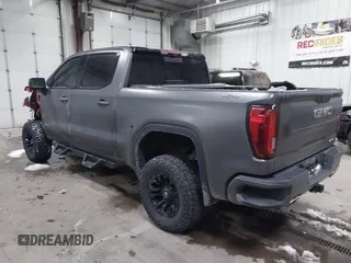2021 GMC Sierra 1500 AT4 with VIN 3GTP9EEL1MG284910, listed as a IAAI auction lot 41023969 with 53,209 mi miles. Bid and sale history available at carsss.com. Image 3.