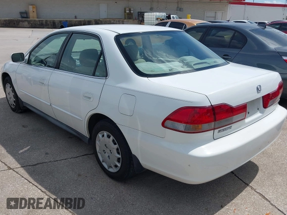 2002 Honda Accord LX z VIN 1HGCG56482A067556, wystawiony jako IAAI lot #42494292 z przebiegiem 209 511 mil mil oraz . Historia ofert i sprzedaży dostępna na DreamBid. Obrazek 3.