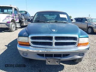 1999 Dodge Dakota SLT with VIN 1B7GG22Y2XS157214, listed as a IAAI auction lot 39776504 with 144,928 mi miles and . Bid and sale history available at carsss.com. Image 12.