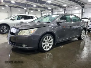 2013 Buick LaCrosse Touring с VIN 1G4GJ5G38DF182344, выставлен на аукционе Copart как лот 52602055 с пробегом 153 759 миль миль и Списание • Salvage title. История ставок и продаж доступна на DreamBid. Изображение 1.