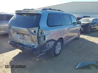 2014 Toyota Sienna XLE with VIN 5TDYK3DC7ES447903, listed as a IAAI auction lot 41835665 with 224,492 mi miles. Bid and sale history available at carsss.com. Image 4.
