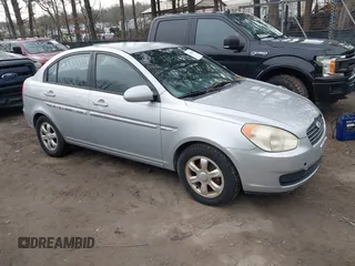 2006 Hyundai Accent GLS with VIN KMHCN46C46U012561, listed as a IAAI auction lot 41750609 with 286,770 mi miles. Bid and sale history available at carsss.com. Image 1.