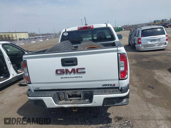 2021 GMC Canyon 4WD AT4 z VIN 1GTG6FENXM1291689, wystawiony jako IAAI lot #42038884 z przebiegiem 54 884 mil mil oraz . Historia ofert i sprzedaży dostępna na DreamBid. Obrazek 16.