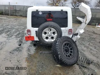 2013 Jeep Wrangler Sahara z VIN 1C4AJWBG7DL512437, wystawiony jako Copart lot #48928325 z przebiegiem Nie podano mil oraz Szkoda całkowita • Salvage title. Historia ofert i sprzedaży dostępna na DreamBid. Obrazek 6.