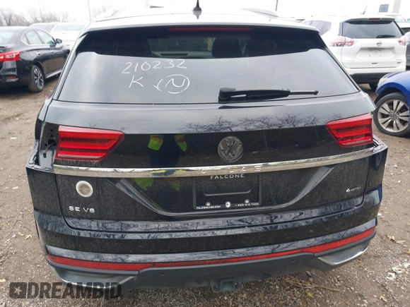 2023 Volkswagen Atlas SE z VIN 1V2HE2CA1PC210232, wystawiony jako IAAI lot #40966039 z przebiegiem 4 064 mil mil oraz . Historia ofert i sprzedaży dostępna na DreamBid. Obrazek 17.