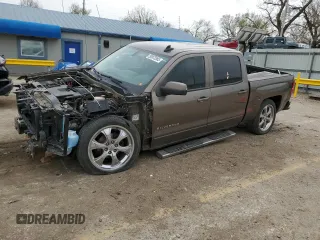 2015 Chevrolet Silverado 1500 LT with VIN 3GCPCREC3FG376385, listed as a Copart auction lot 50973385 with 148,545 mi miles and Salvage Title. Bid and sale history available at DreamBid. Image 1.