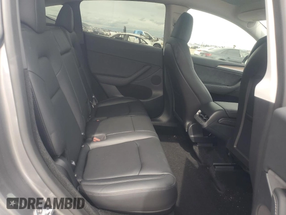 2025 Tesla Model Y Long Range with VIN 7SAYGDED7SF227582, listed as a Copart auction lot 47556595 with 5,340 mi miles and Salvage Title. Bid and sale history available at DreamBid. Image 10.